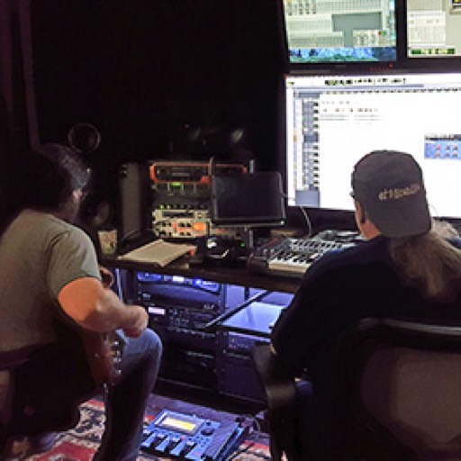 Michael Brinson on guitar and Dennis Smith tracking guitar parts...